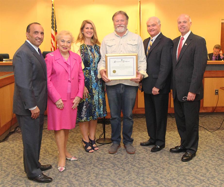 The Monmouth County Board of Chosen Freeholders recognize Robert Burlew for being named “Inspector of the Year” by the New Jersey Building Officials Association at their regular public meeting on May 28 in Keyport, NJ. Pictured left to right: Freeholder Thomas A. Arnone, Freeholder Lillian G. Burry, Freeholder Deputy Director Serena DiMaso, Robert Burlew, Freeholder John P. Curley and Freeholder Director Gary J. Rich, Sr.